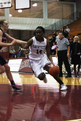 Samantha Jordan '13 drives to the basket against Army