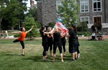 The Kathy Kroll Dance and Paper Theatre Company demonstrates the technique of origami through their performance on the Quad. (Nicole Maselli ‘14)