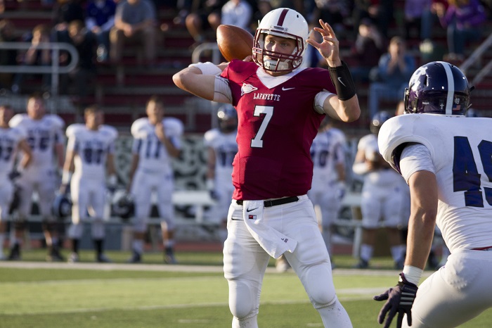 Sophomore quarterback Drew Reed looks for an open target downﬁ el