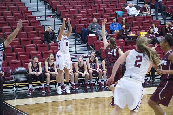 Jamie O’Hare runs the pick and roll with teammate Ashley Lutz