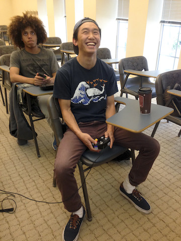 Eugene Chung ‘15 laughing after playing a round of Smash Bros. [Photo by Elizabeth Lucy ‘15]