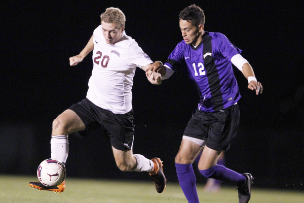 Todd Forrester ‘16 escapes an Albany defender. [Photo courtesy of Athletic Communications]