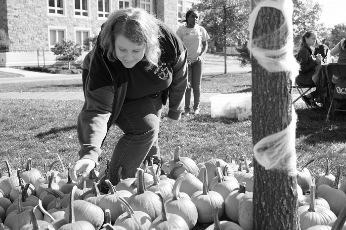 A student picks a pumpkin to decorate [Photos by Clay Wegrzynowicz ‘18]